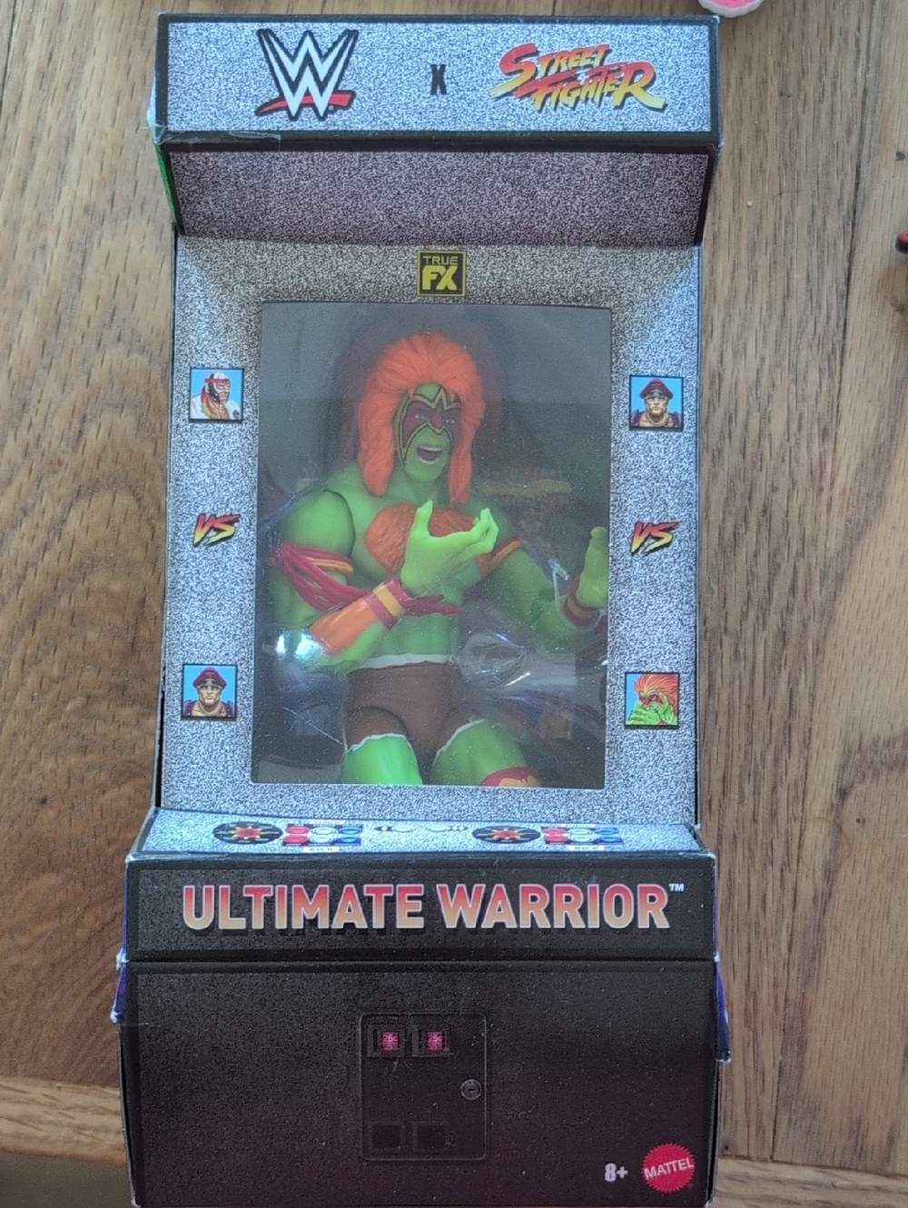 WWE x Street Fighter Ultimate Warrior Figure - Green & Orange